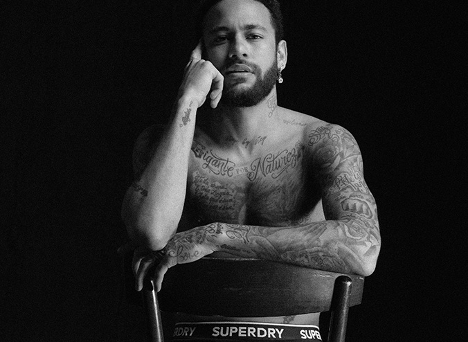 Image of Neymar Jr sat on chair looking at camera